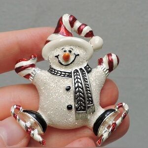 Ice skating candy cane snowman pin